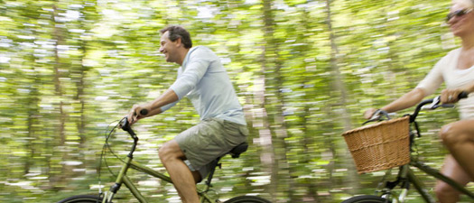 Adults riding bicycle